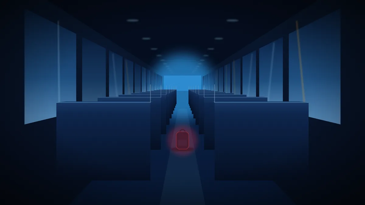 An empty school bus aisle at night with one small backpack left behind, lit by moonlight